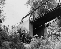 Police Investigate Footbridge in Kingsbury Run, Attribution: Cleveland Press Archives, Cleveland State University